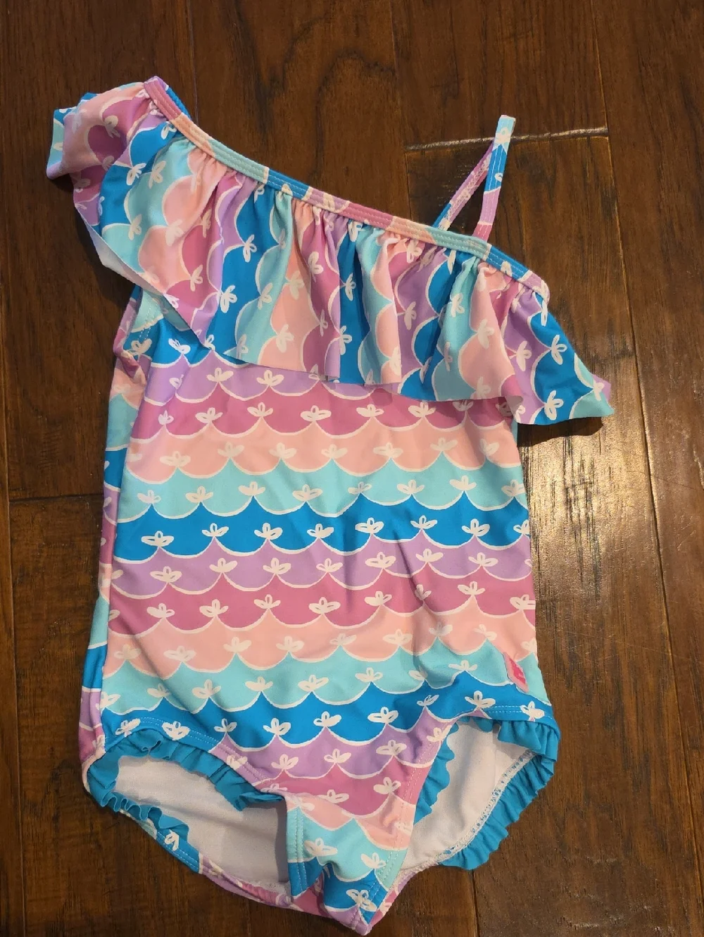 NWOT Ruffle Butts Pastel Pink Purple Aqua One-Shoulder Ruffle Swimsuit Size 7